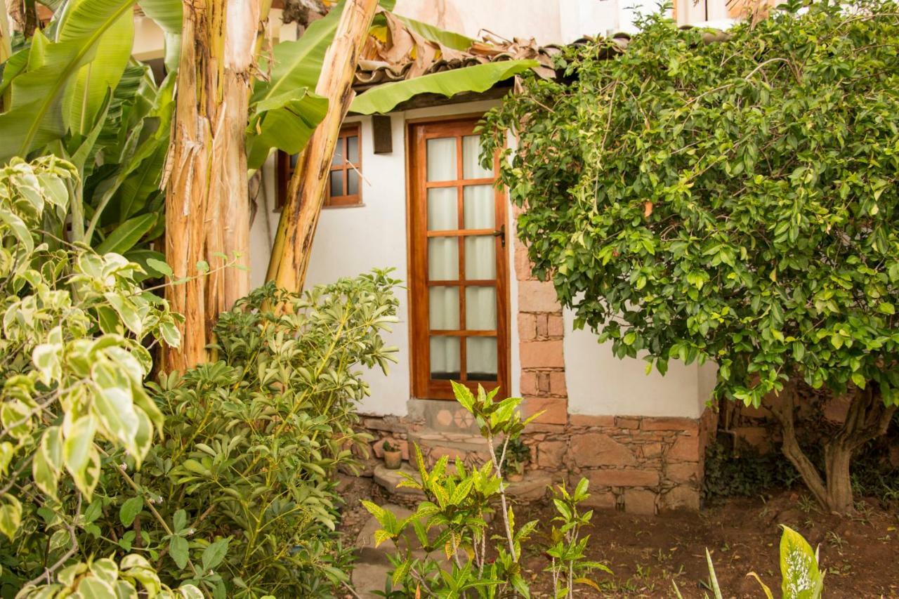 Quarto Triplo com Vista do Jardim